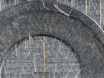 That piece of lint is stuck in the beginnings of a crack